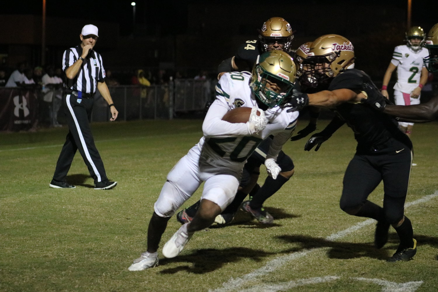 Camryn Smith of Nease looks to turn the corner against the St. Augustine defense.